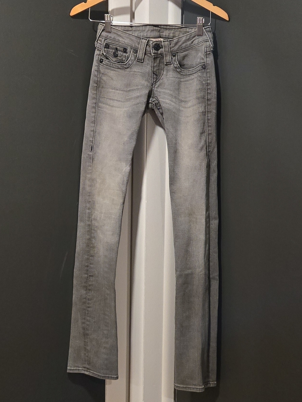 True Religion dark ash gray low rise skinny jeans with black stitching